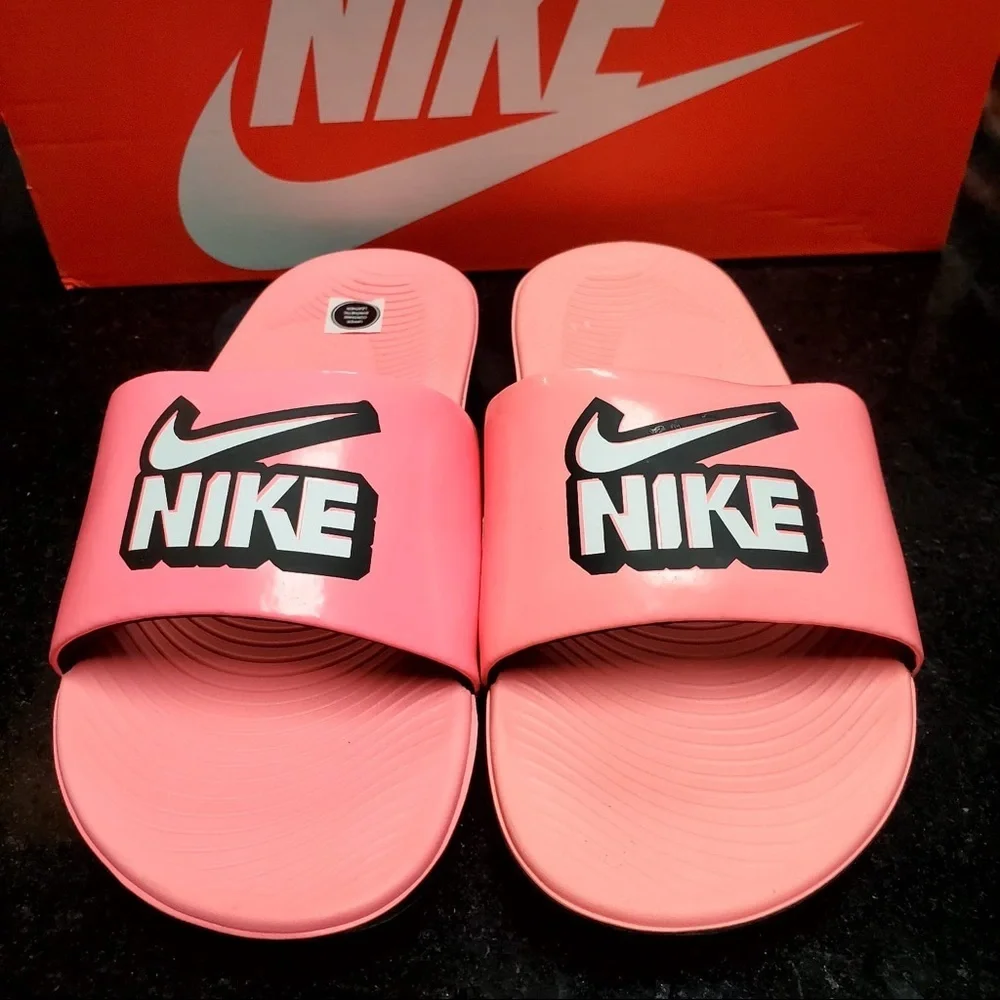 Sz 4y pink Nike slides